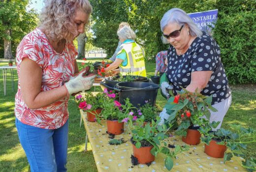 Dunstable in Bloom Local Business Owners join DiB to Plant Baskets